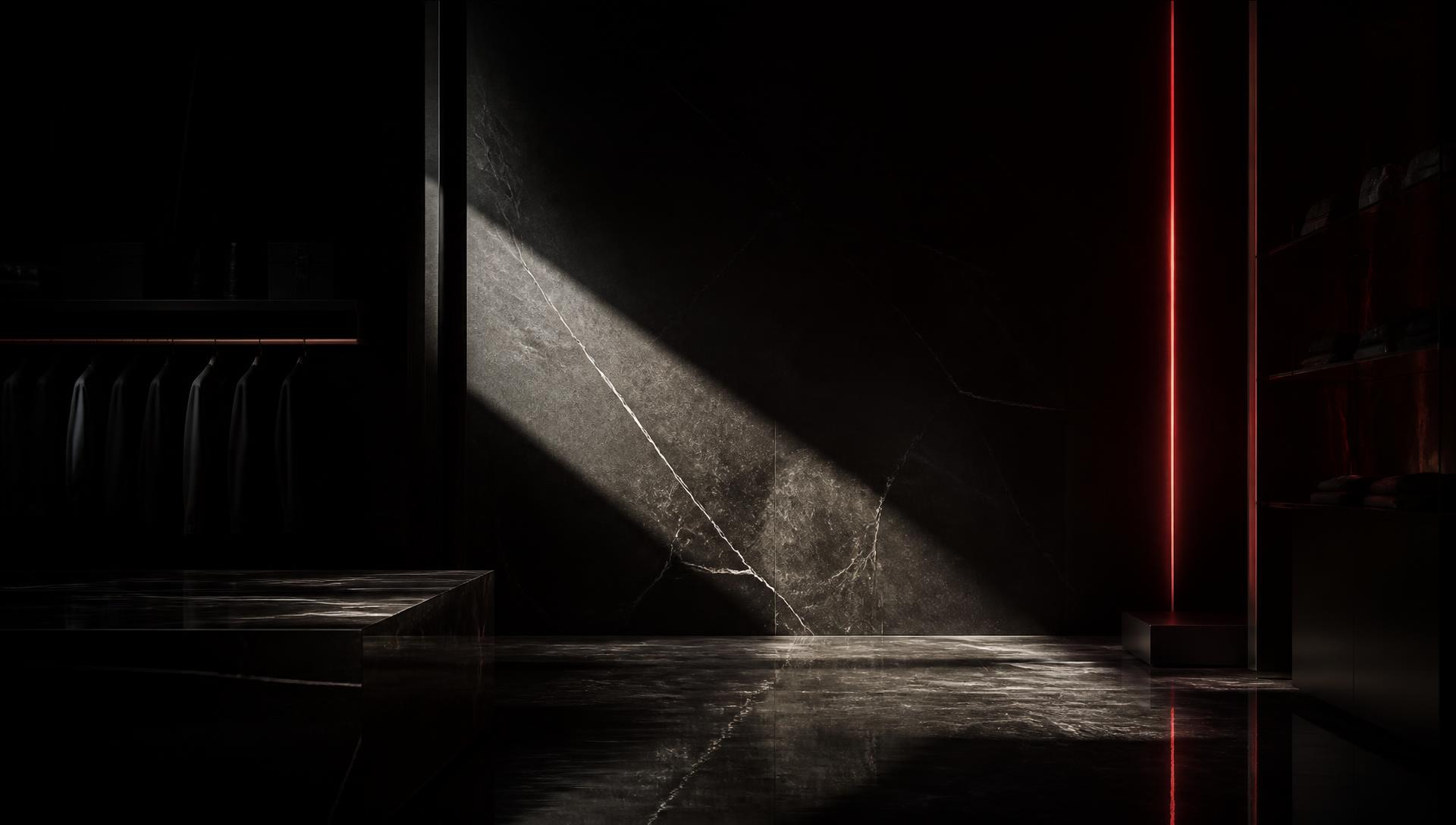 Interior escuro de boutique com luz cortando o mármore preto